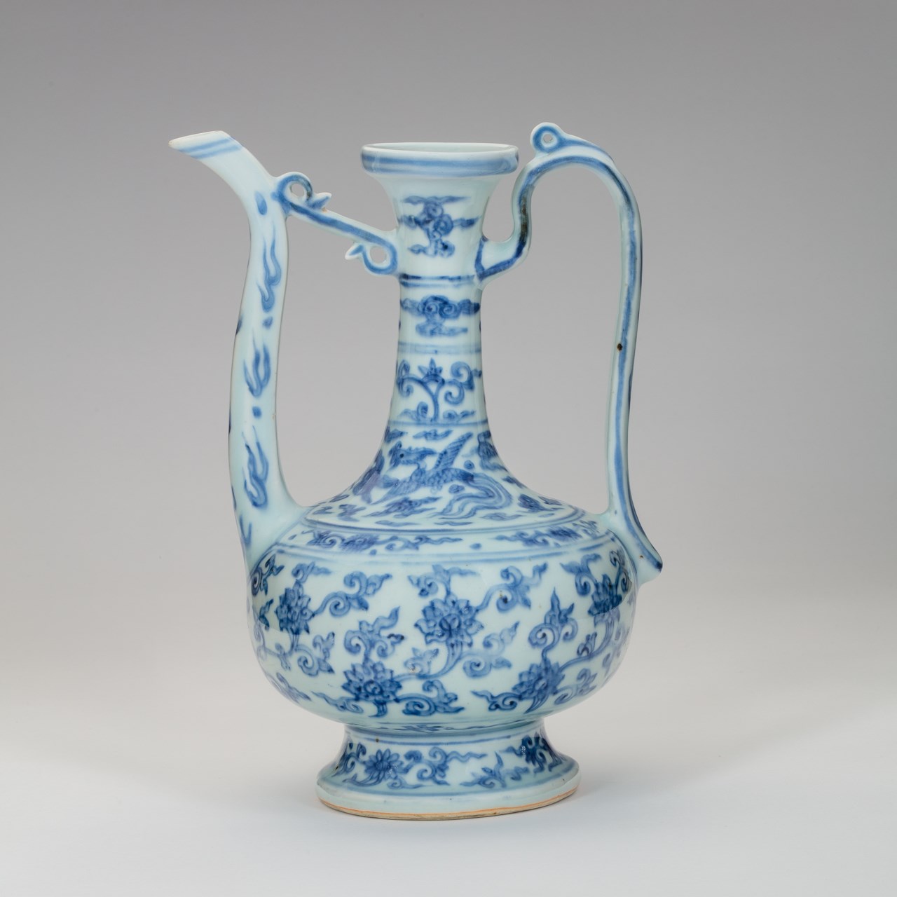 A MING BLUE-AND-WHITE EWER WITH XUANDE MARK 明宣德款