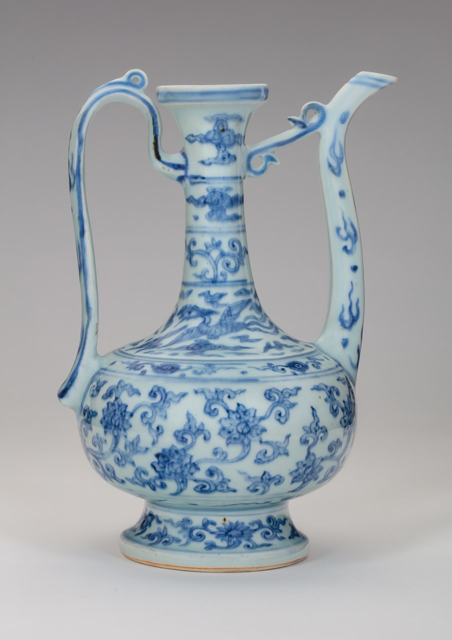 A MING BLUE-AND-WHITE EWER WITH XUANDE MARK 明宣德款青花缠枝莲纹执