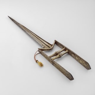 A punch dagger (katar) with iron handle and silver inlaid inscription