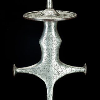 Silver overlaid sword hilt